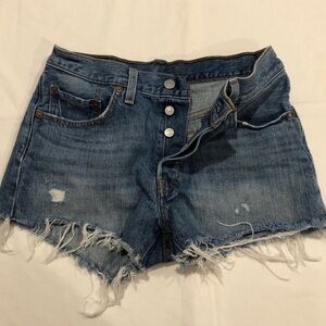 Levi’s button fly denim shorts. Women’s size 26. Frayed Hem.
